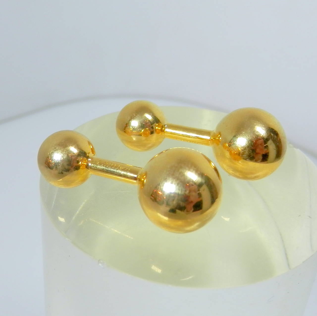 Contemporary Cartier gold barbell cufflinks