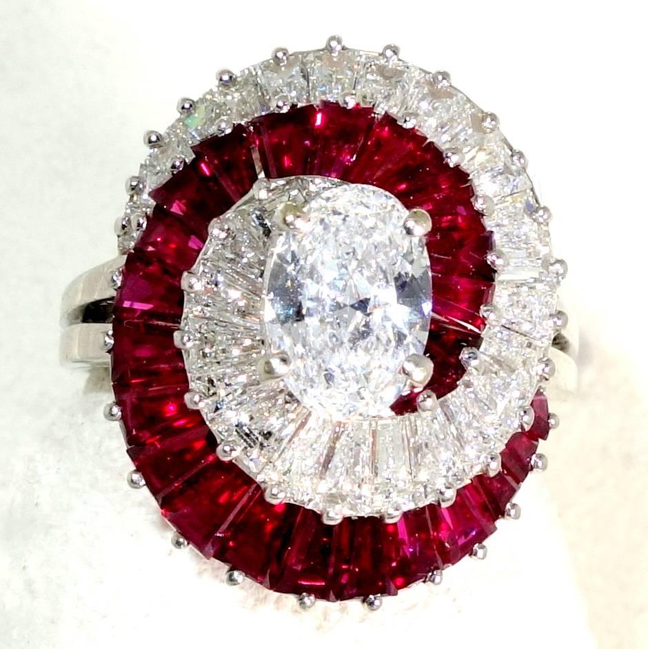 3.65 cts of fancy cut diamonds and 3.0 cts of fancy cut rubies are set in platinum to create a striking color contrast.
