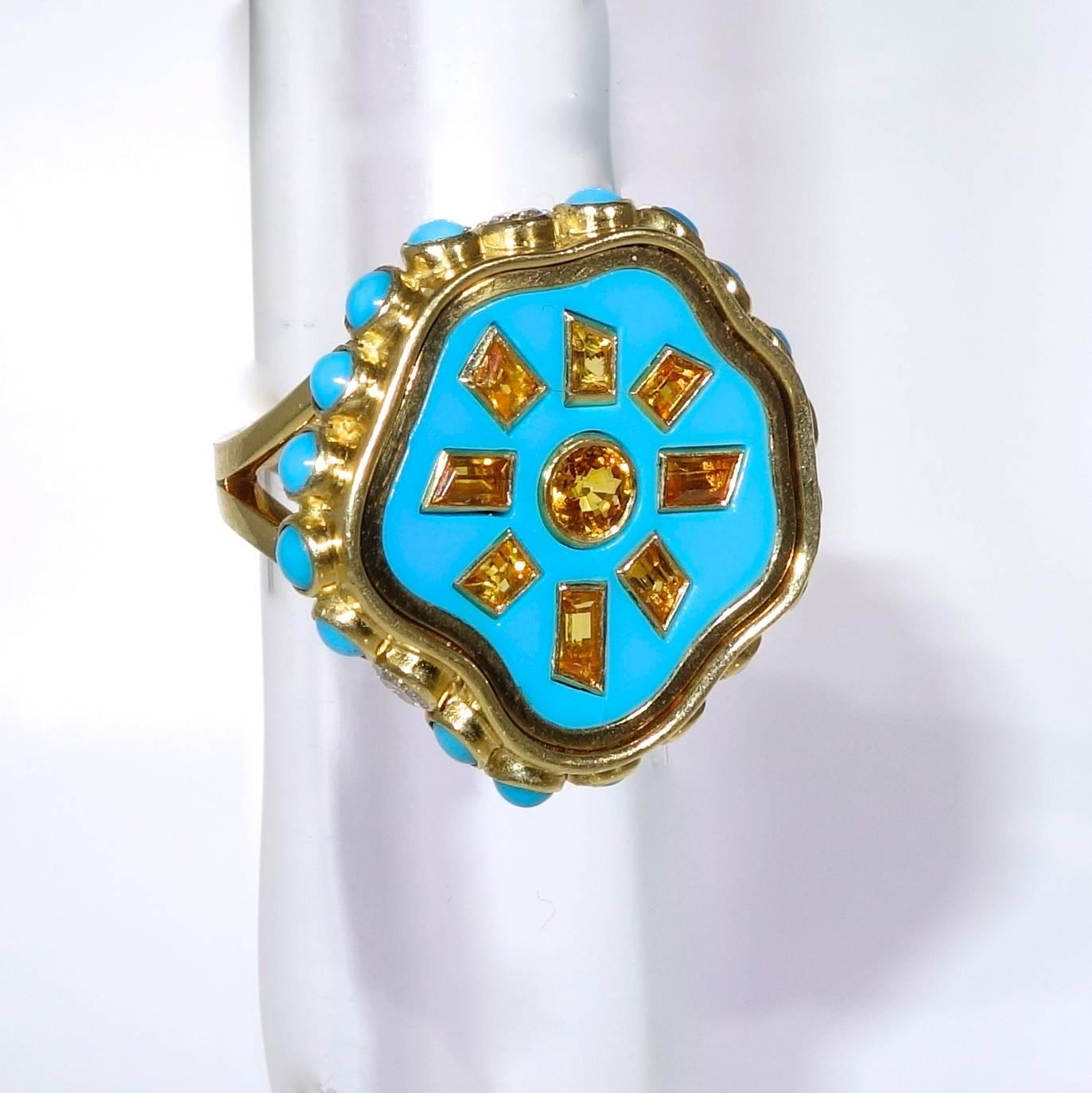   There are 17 turquoise weighing approximately .85 ct,s and 3 fine round brilliant cut diamonds weighing approximately .09 cts.  This ring bears English hallmarks for London 2010.  It is now a size 7.5 and we can size it easily. The width of this