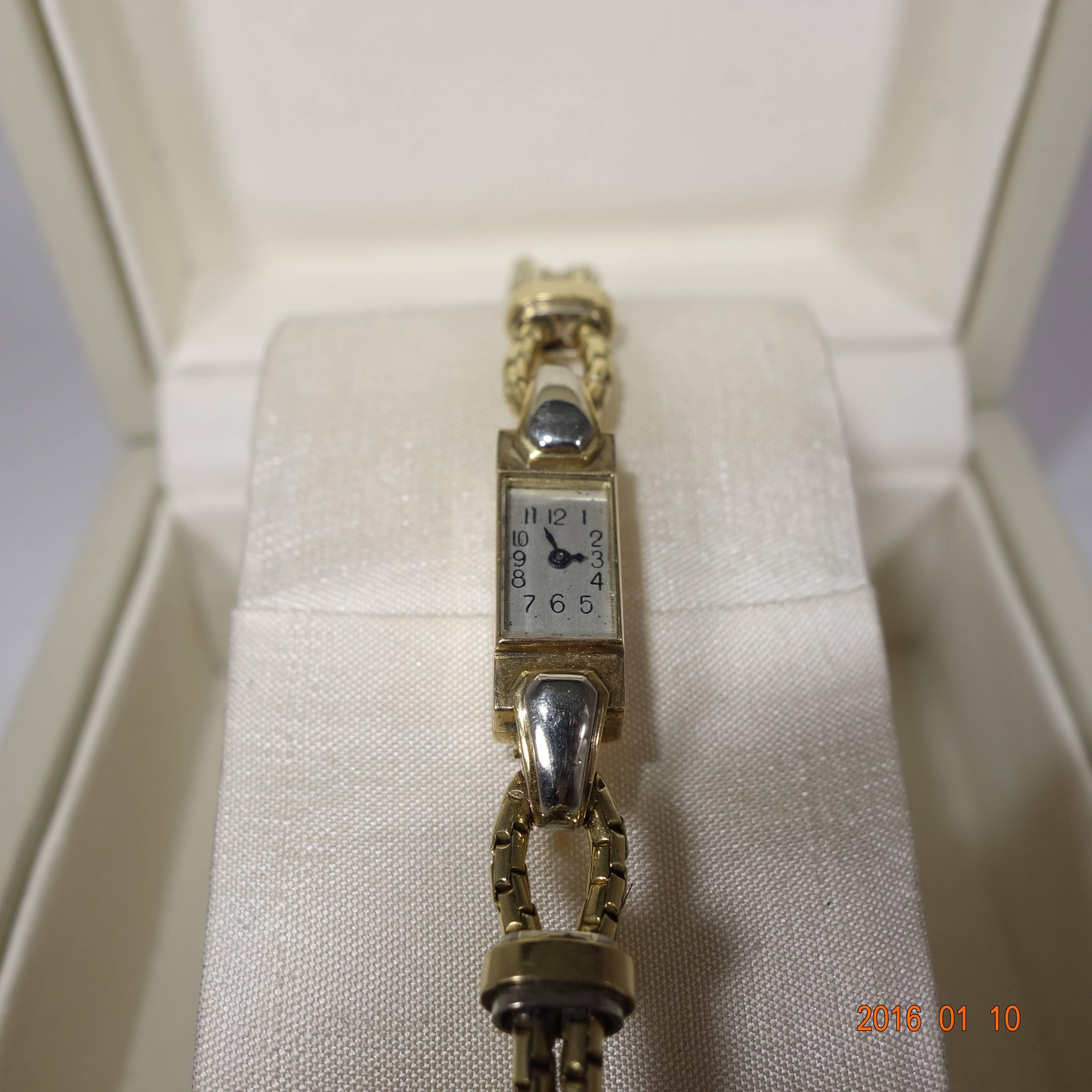 Van Cleef & Arpels Lady's Yellow Gold Baguette Shaped Wristwatch In Good Condition In Aspen, CO