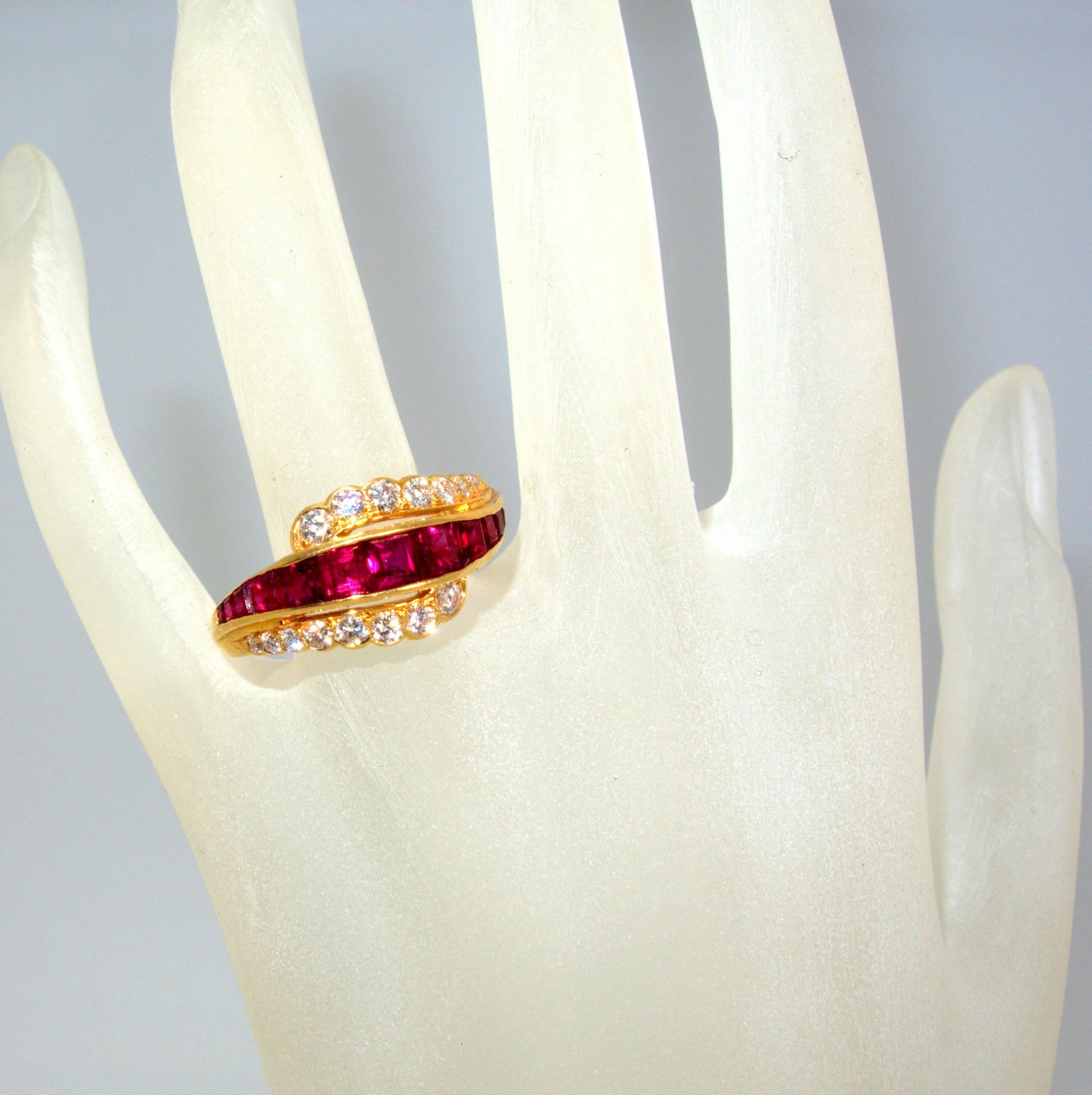 18K yellow gold with a center row of 11 fine matching red rubies.  The approximate ruby weight is 1.0 ct.There are 16 accenting fine round brilliant cut diamonds all colorless to near colorless (F/G) and VVS in clarity.  The approximate diamond