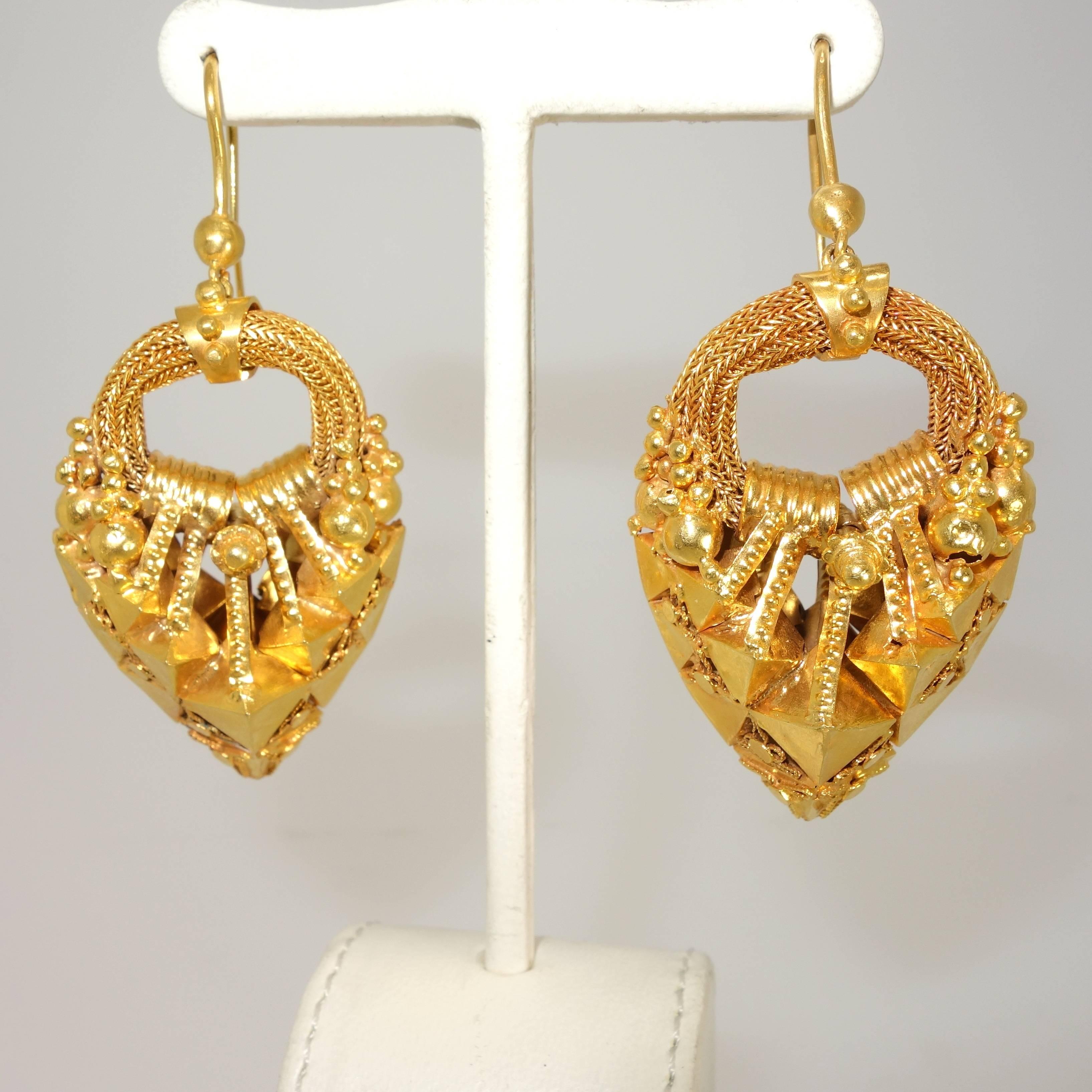 Hand made in the last quarter of the 19th century and in 22K, these basket motif earrings are probably European and  Greek or Roman revival.  They are light weight and thus easy to wear.  They are in good condition given their age, but there is some