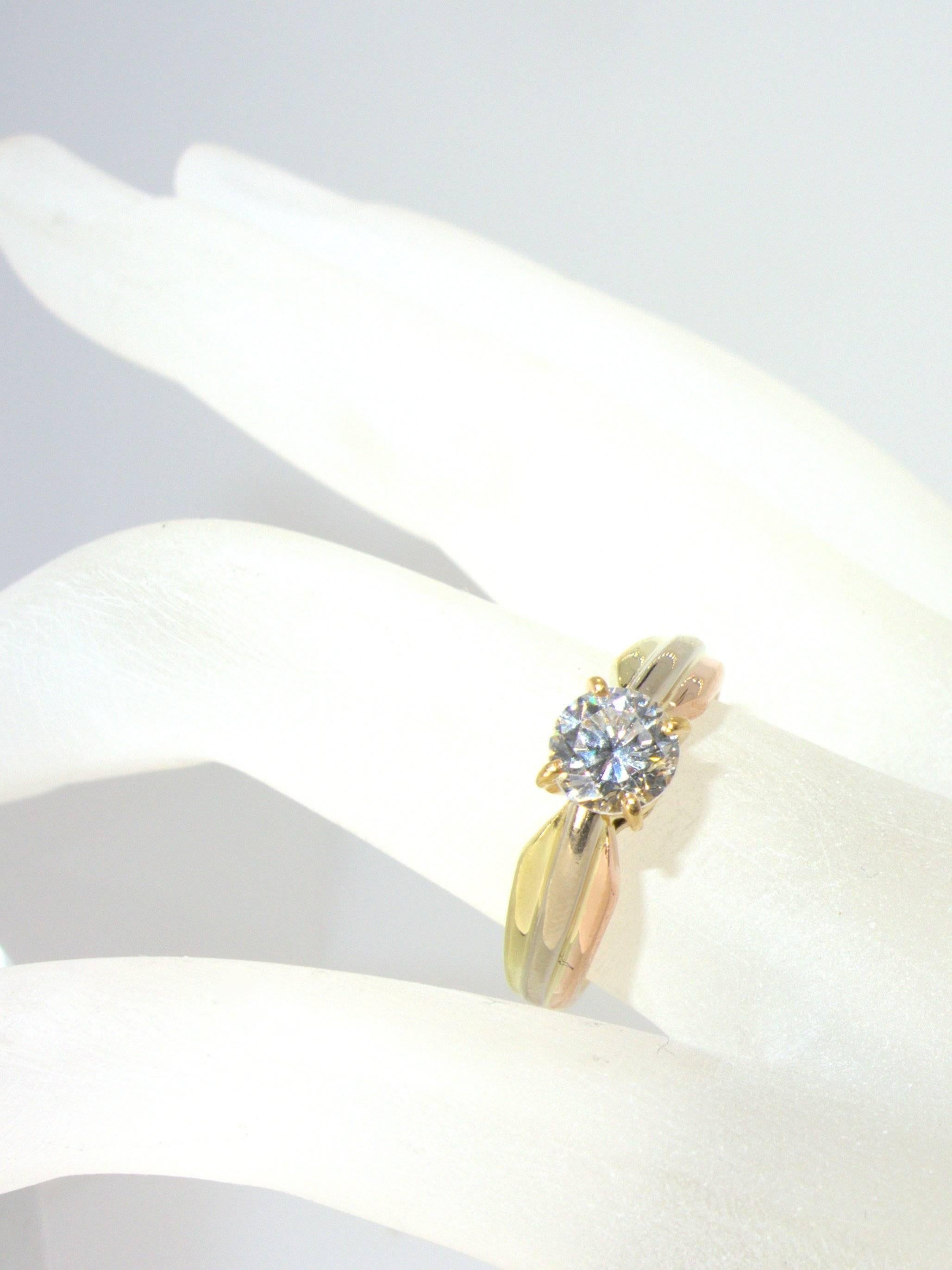Contemporary Cartier Diamond Tricolor Gold Ring