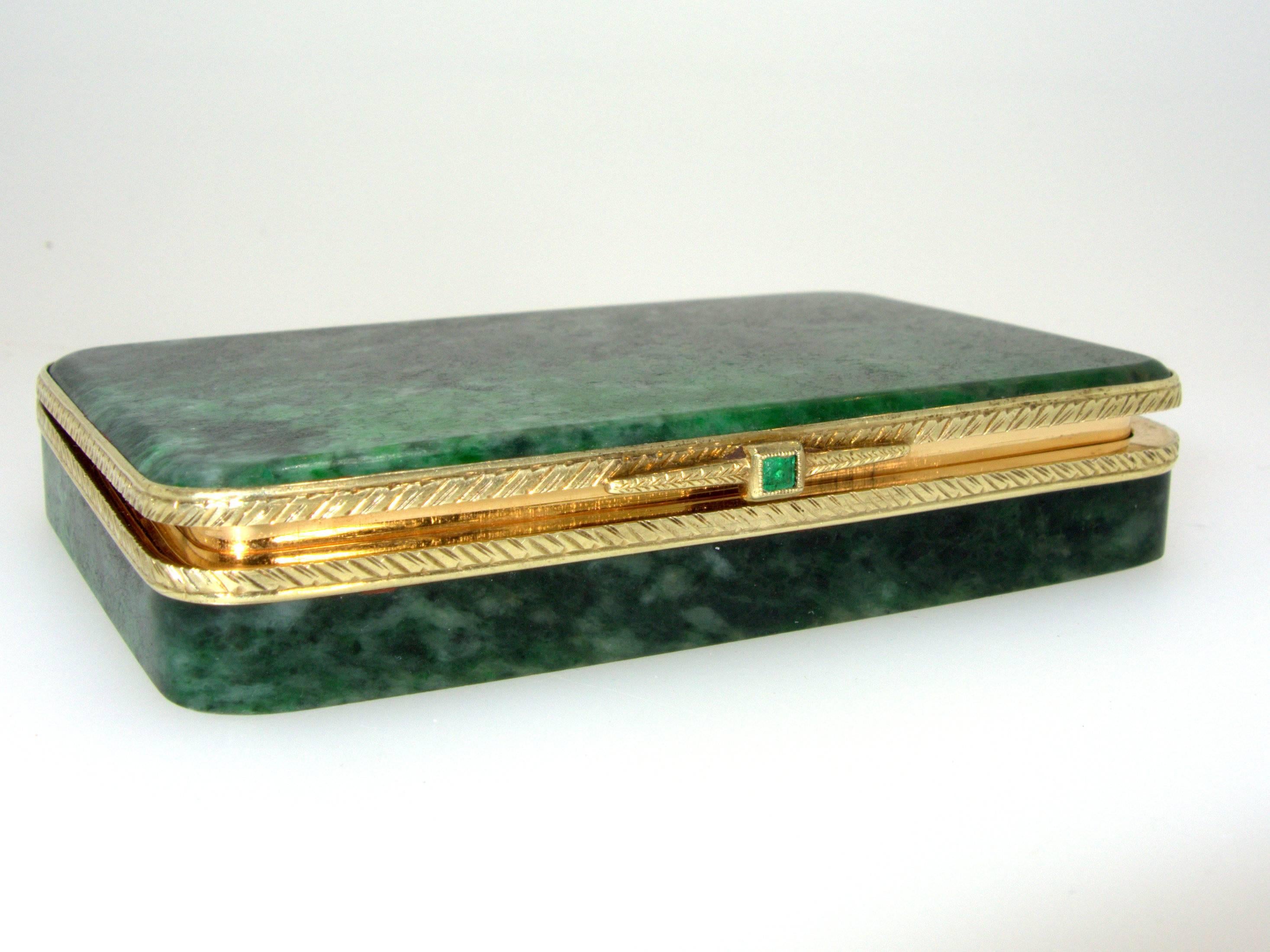 This gold box opens and closes with remarkable precision.  The jadeite has been tested and found to be type 