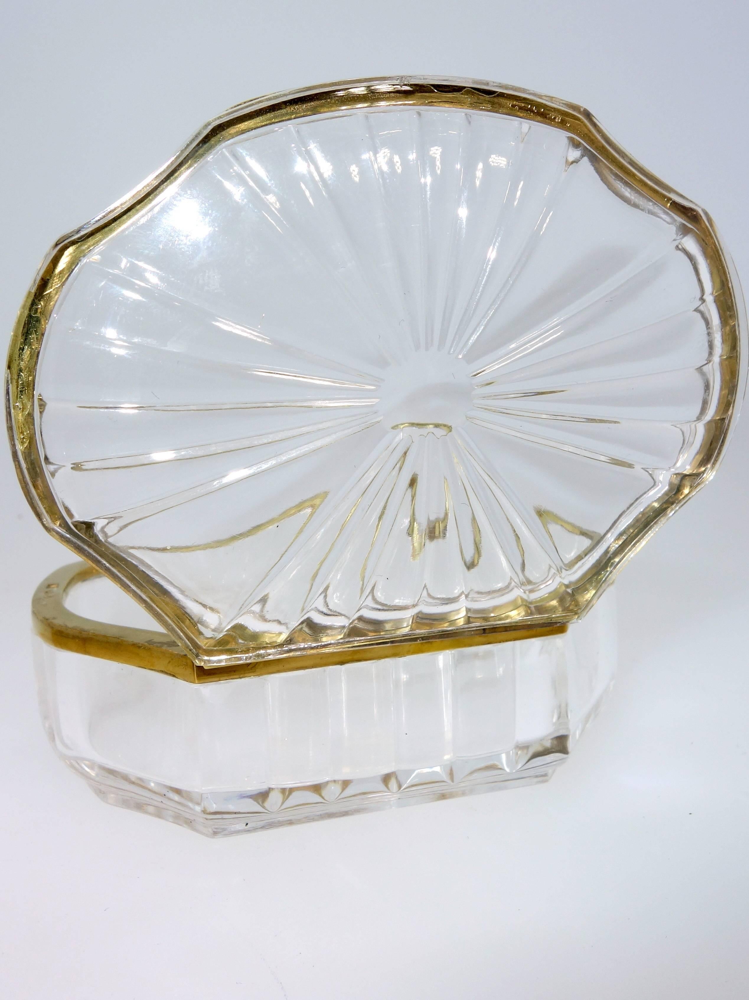 Dating from the 1800's, this wonderful object consists of natural rock crystal - not glass - and gold.  Notice that the shape of the piece is the same as the architecture of rooms in the finest houses.  The piece measures 3.5 inches in length and