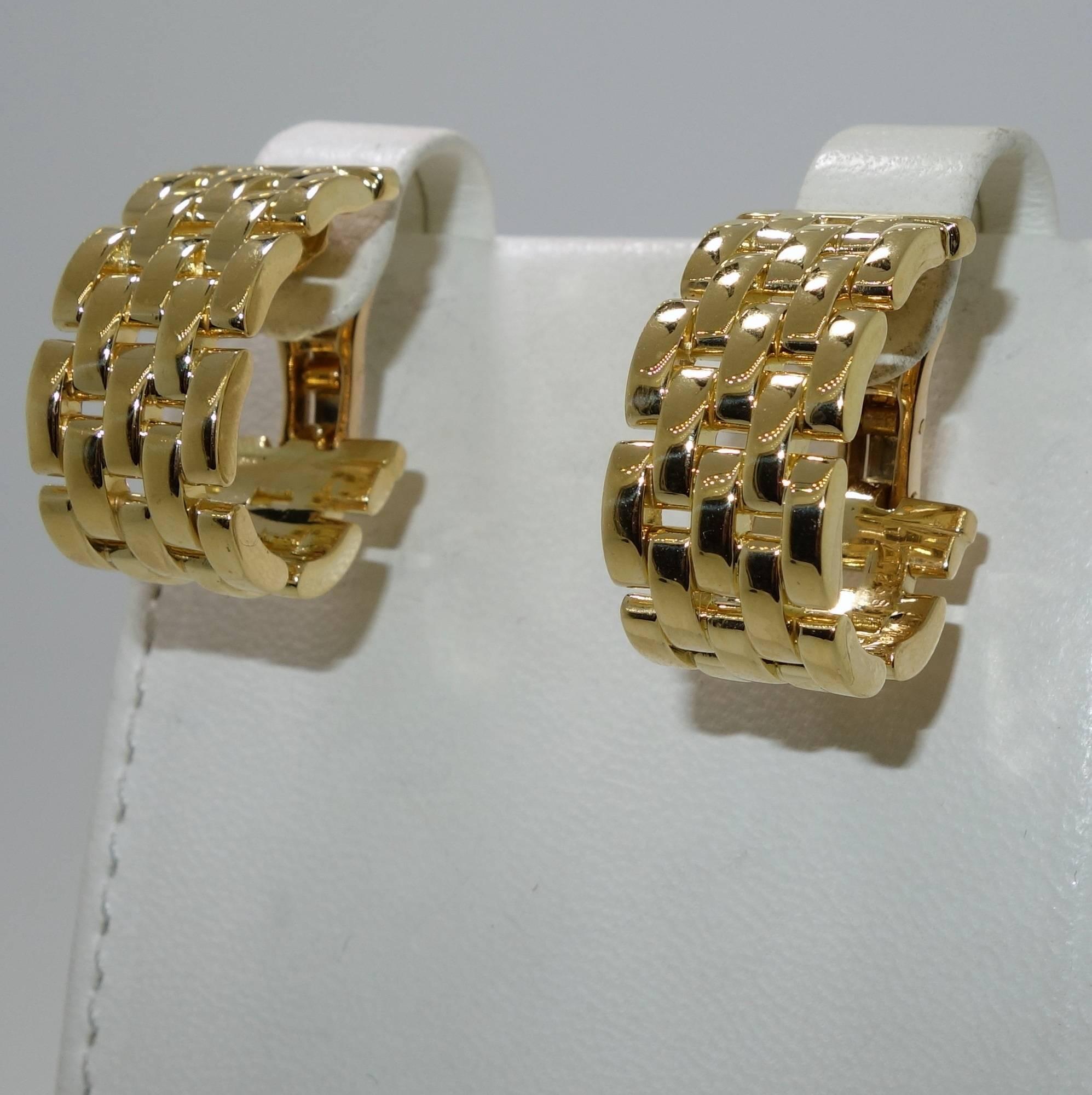 The length is just shy of two inches long, they are .5 inches wide.  They are signed and numbered by Cartier on the interior of the earrings with the stamp of 750 for 18K gold.  24.14 grams.