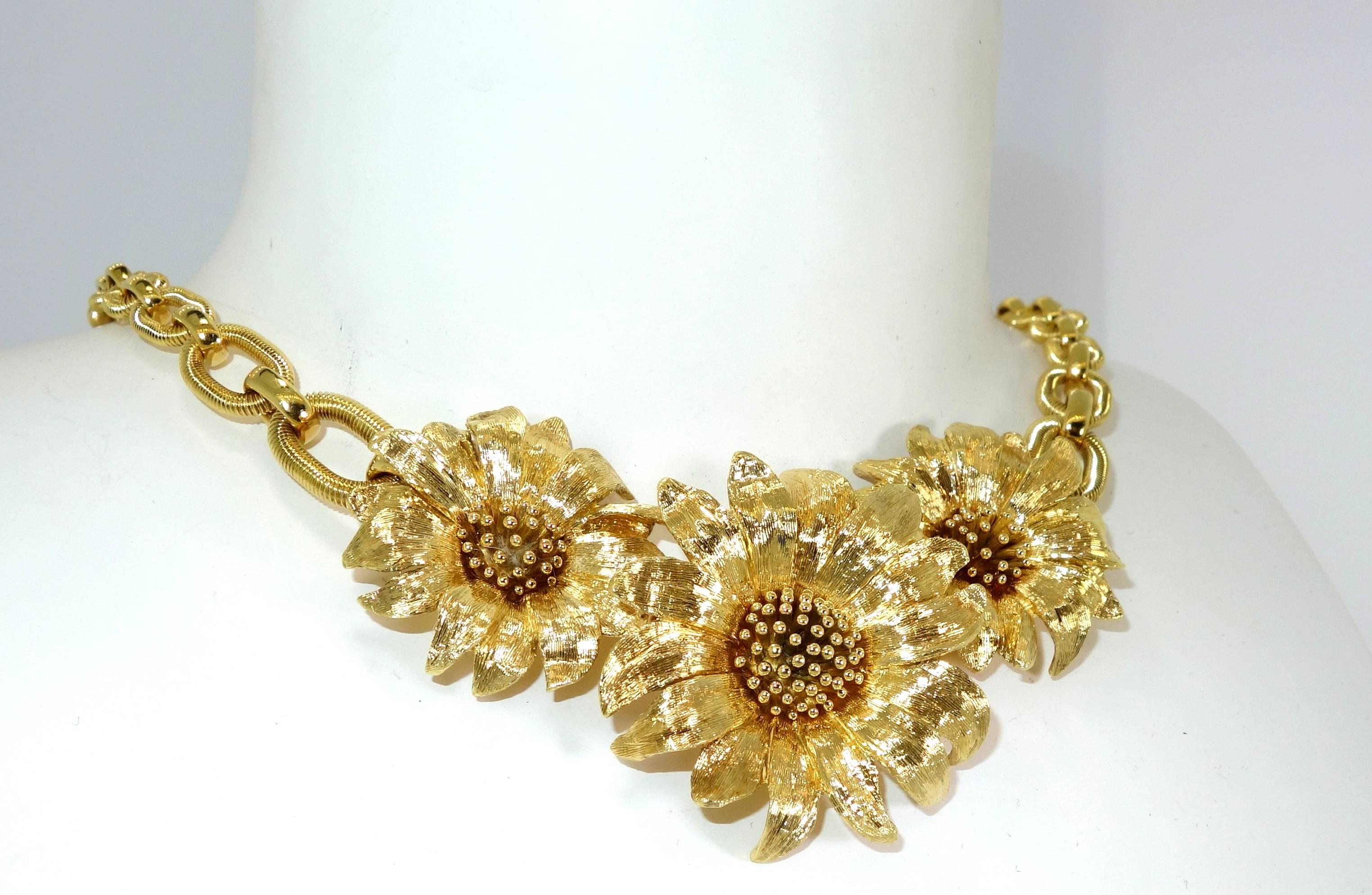 This bright yellow statement for the neck, has a length of 17 3/8 inches long.  There is also a  matching pair of earrings, offered separately, that one can  see in the earring section.  This necklace weighs 90.12 grams.  It is marked on the verso