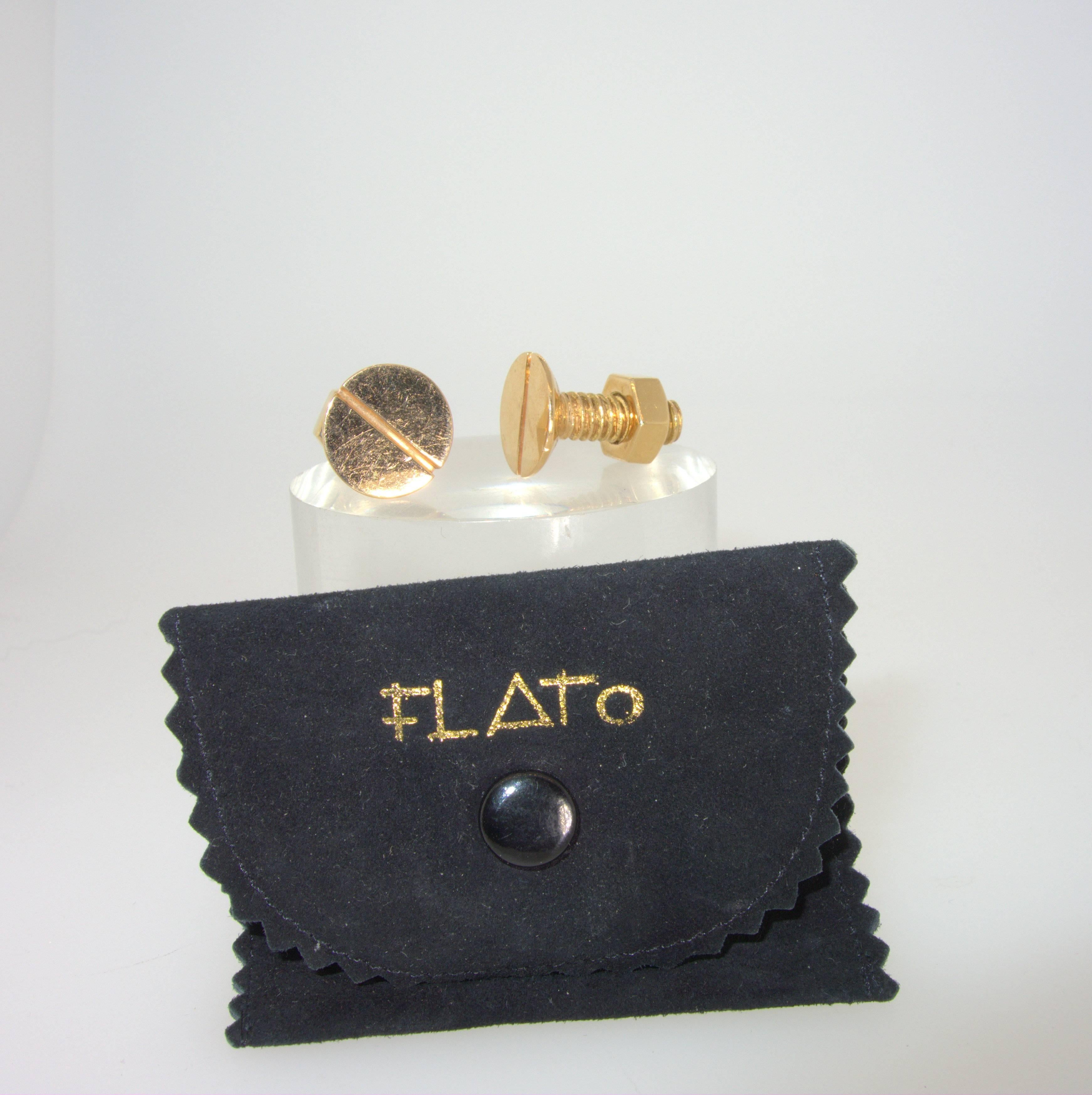 As seen in  Masterpieces of American Jewelry, this 18K yellow gold nut and bolts cuff-links (the screw un-screws when putting  on) was made by the  highly collected American designer Paul Flato in the mid 20th century.  As the story goes, Paul Flato