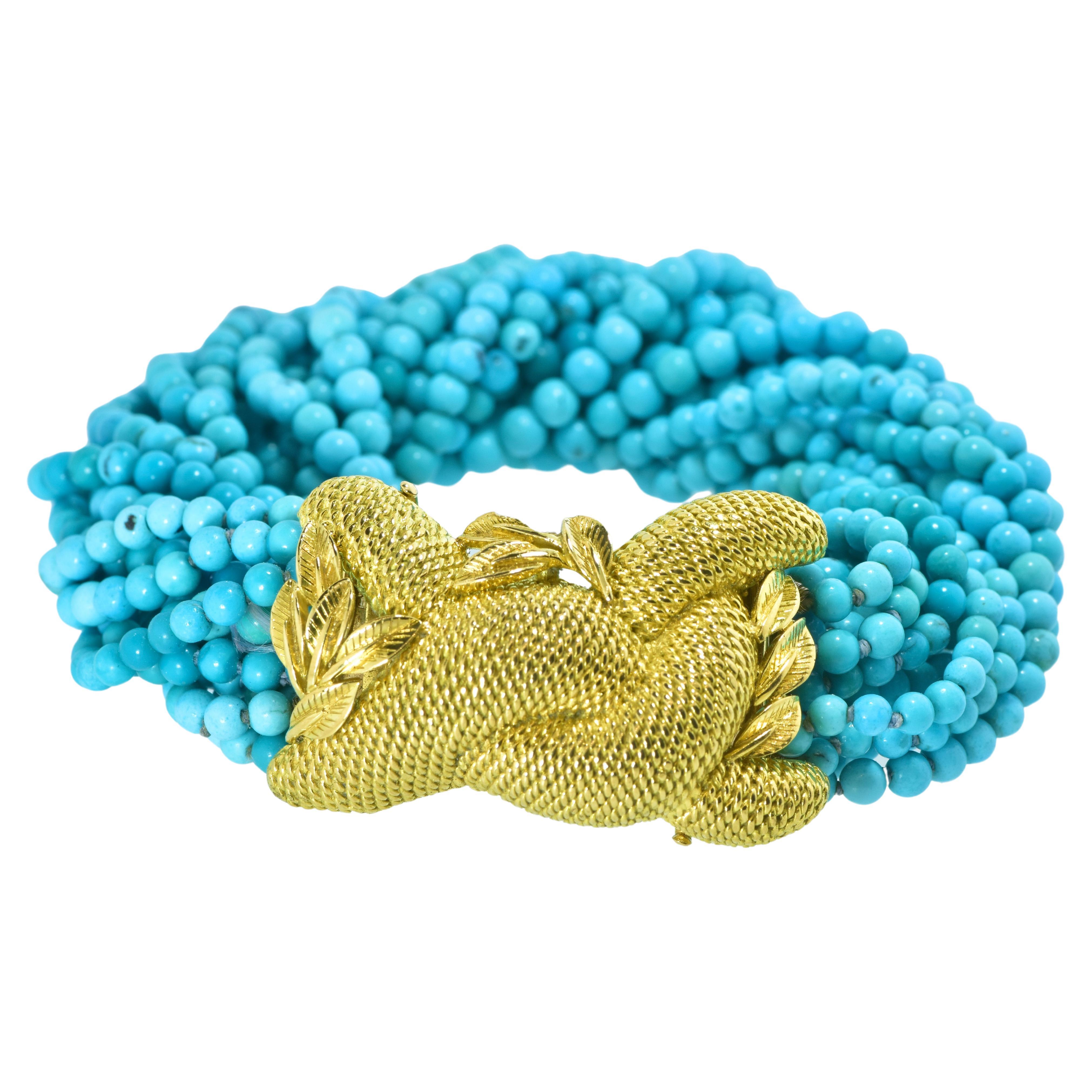 Fine Turquoise Bead Torsade Bracelet Centering an 18K High Relief Clasp, c. 1965 For Sale