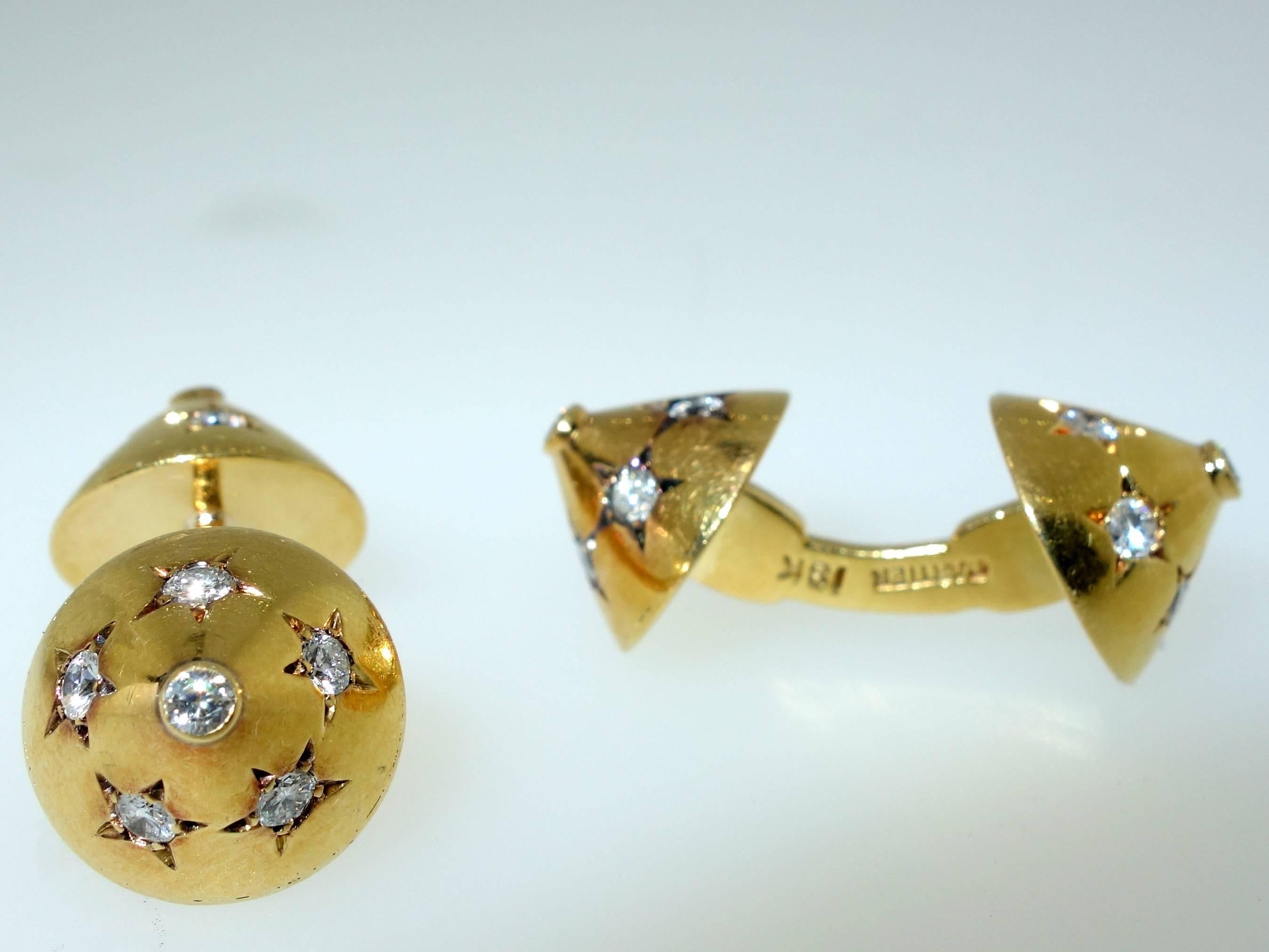 An unusual Retro design from Cartier, this 18K cuff-links have gypsy-set white diamonds on both side.  These type of cuff-links are exceedingly easy to put on.  Circa 1948