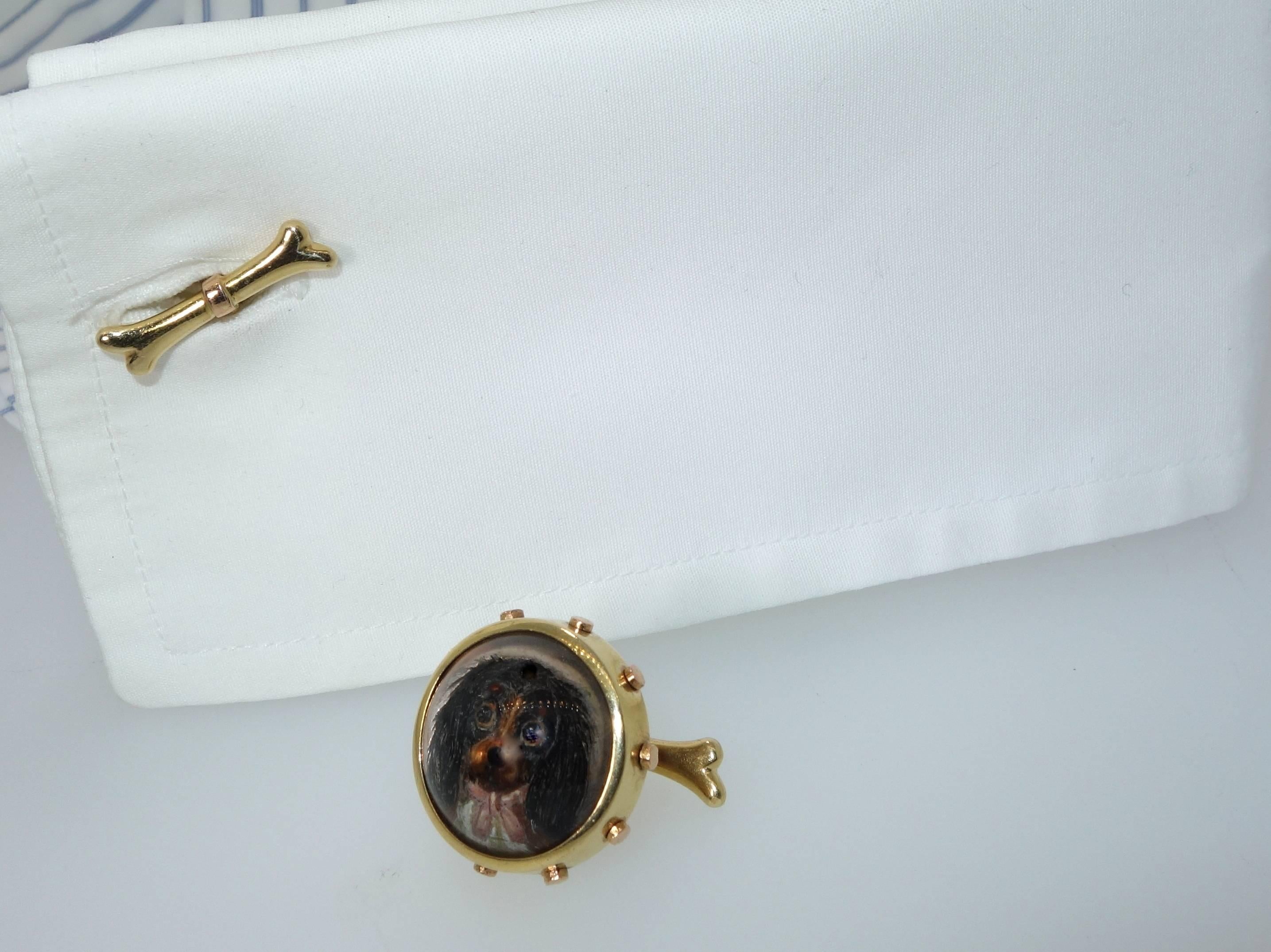Charming doggy cuff-links made circa 1890, notice the pink bow around his neck!
