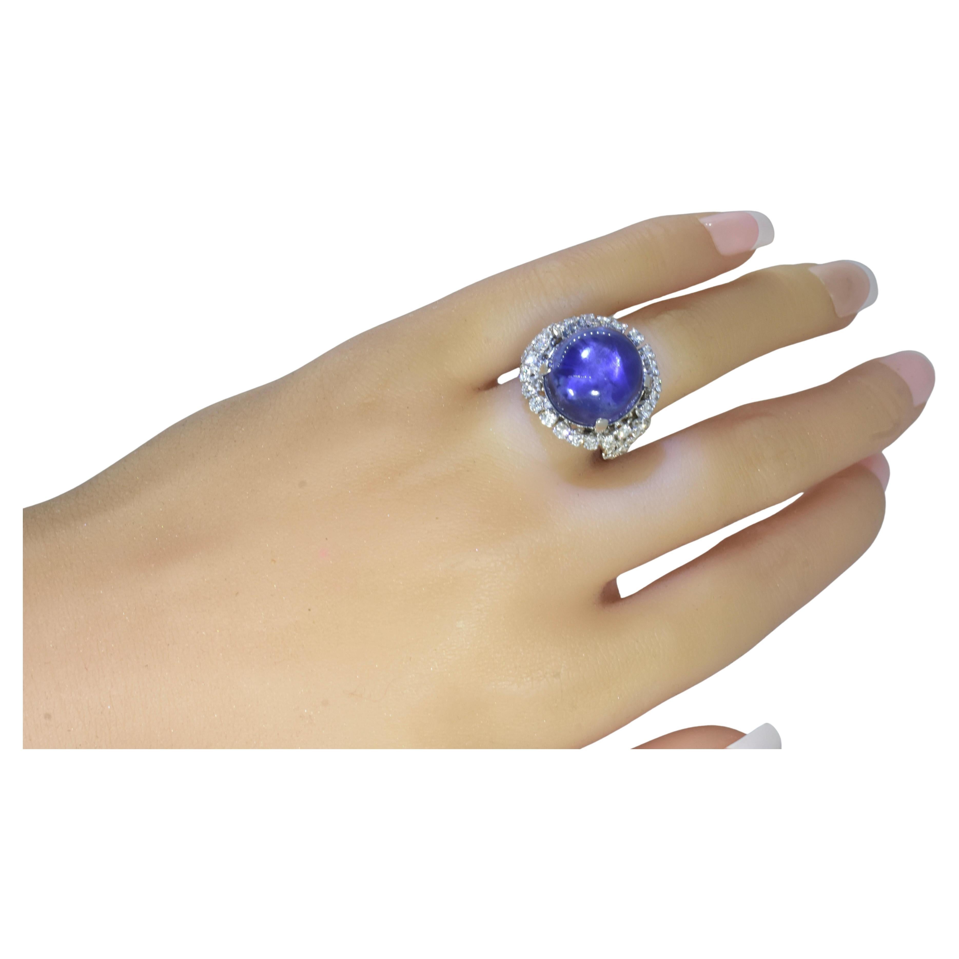 GIA graded unheated Blue Star Sapphire, weighing 27 cts & Diamond Ring, c 1950.
