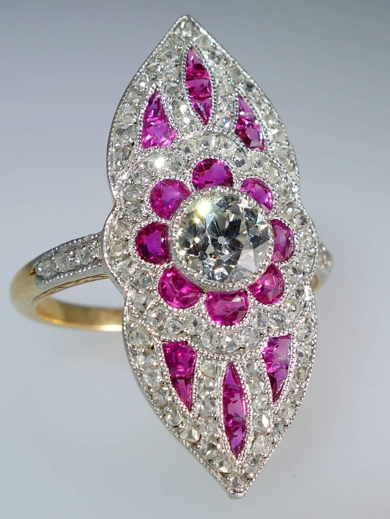 Authentic French Belle Epoque jewelry, such as this ring, is getting extremely difficult to find.  This platinum topped gold ring is a little masterpiece - notice how the 22 fine natural unheated Burma rubies are all fancy cut in milgrained settings