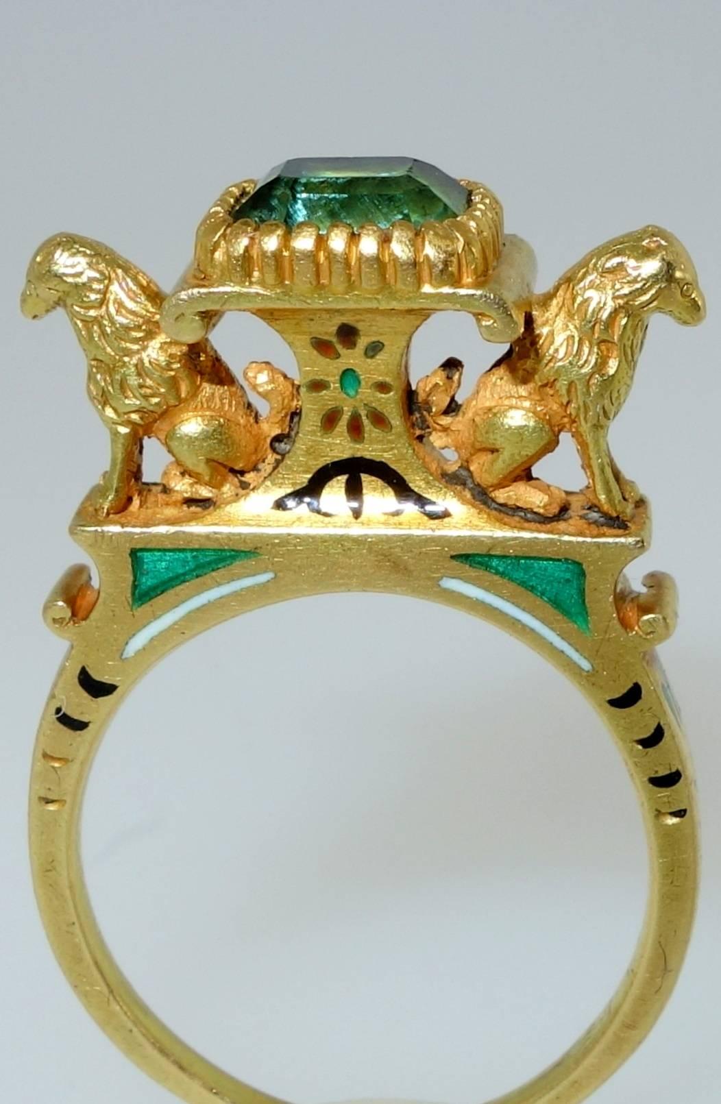 18K French Renaissance Revival ring with very fine workmanship comparable to the works of Louis Weise and Emile Froment-Meurice. With French hallmarks, this ring is in superb condition showing two lion figures supporting the center column of a bezel