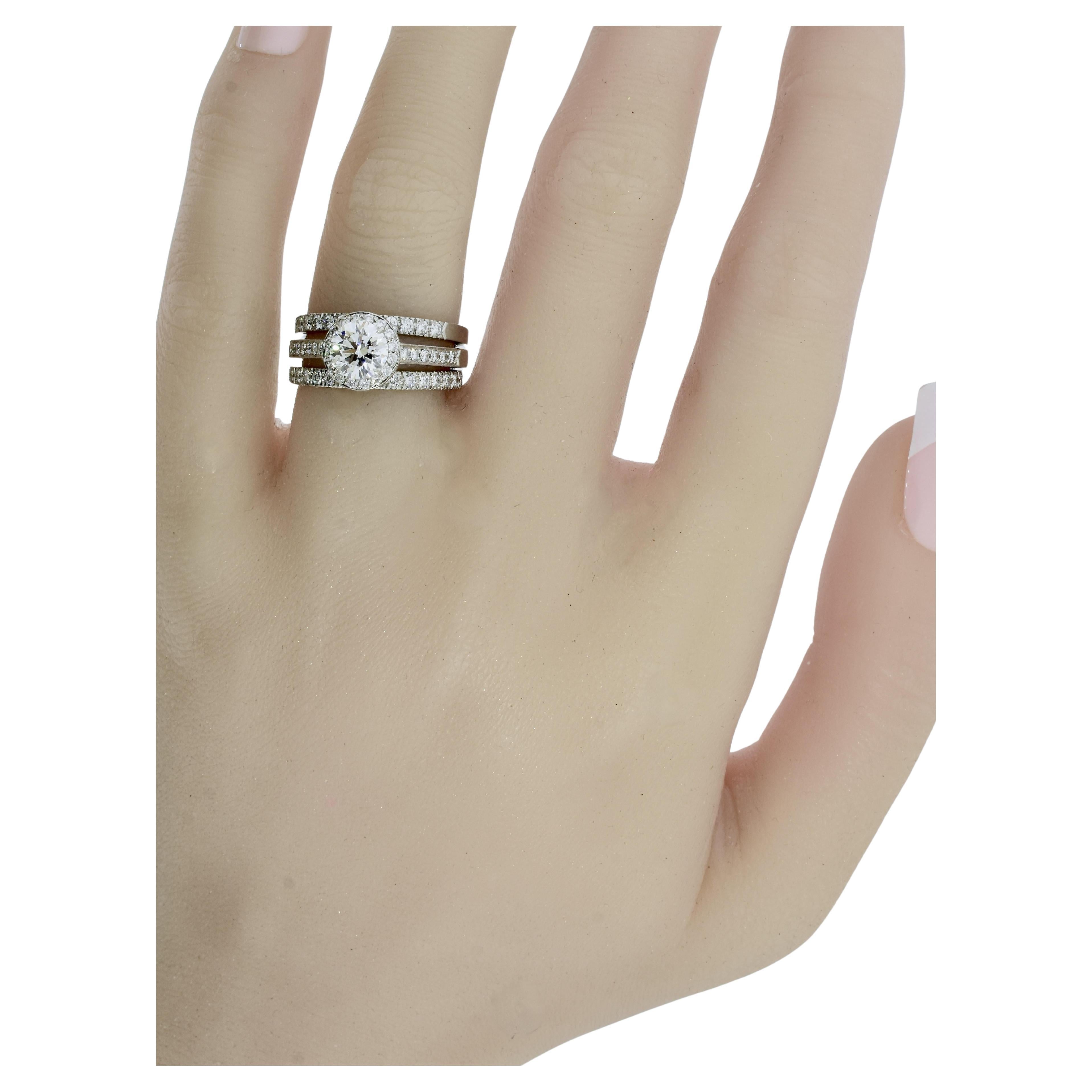 Tiffany & Co. Soleste round brilliant cut diamond engagement ring with two matching Tiffany & Co. diamond bands and a Tiffany & Co. larger gentleman's plain wedding band with a polished finish. All of the rings are in platinum and marked in the