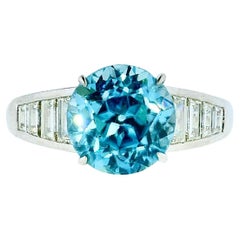 Feiner Ring mit blauem Zirkon und weißem Diamant, Pierre/Famille