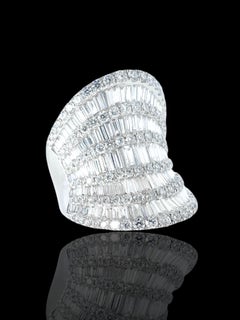 18K and Exactly 6.53 cts. of White Diamond in this Large and Impressive Ring.