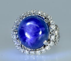 GIA graded unheated Blue Star Sapphire, weighing 27 cts & Diamond Ring, c 1950.