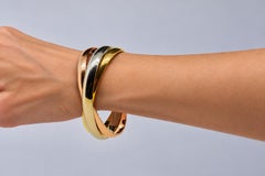 Bracciale vintage italiano a tre giri in oro tricolore 18 carati, 1975