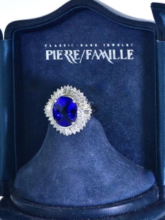 Tanzanite blu reale di ottima qualità, 7,50 carati, e diamante da 1,93 carati. Anello di platino