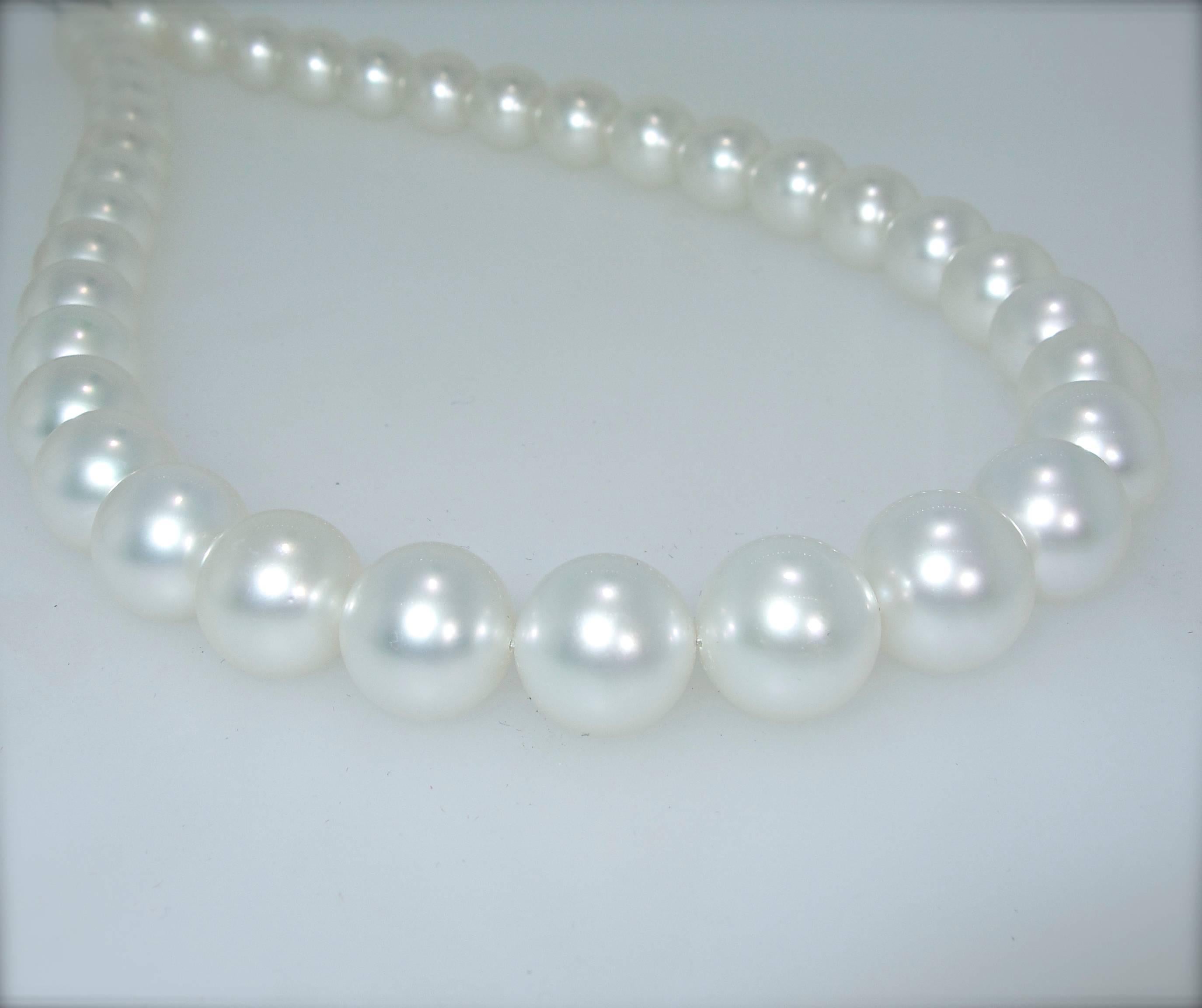 Finely matched cultured South Sea pearls with an extremely high lustre and a silver white color.  There are very few minor natural blemishes.  These  37 fine South Sea pearl have very slight graduation, are in-round,  deeply cultured, 100 percent
