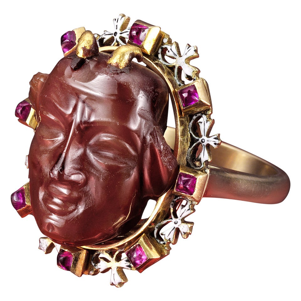 Antique Ring of a Fine Carving Surrounded with Rubies and Enamel
