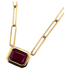 Collana di rubini con castone stile graffetta in oro giallo 14K