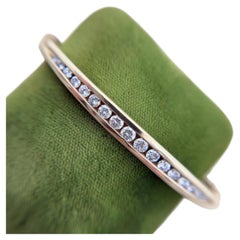 Bracciale rigido vintage con diamanti in oro giallo 14 carati