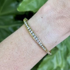 Bracciale rigido vintage con diamanti in oro giallo 14 carati
