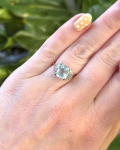 Bague vintage en or jaune et blanc 14 carats, sertie d'une aigue-marine et de diamants