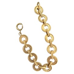 Bracciale vintage a maglie incise in oro giallo 14k