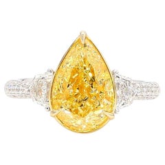 GIA Certified 3.01 Carat Fancy Yellow Pear Diamond Gold Platinum Ring