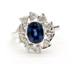 1.10 Carat Blue Oval Sapphire 18K Gold Ring