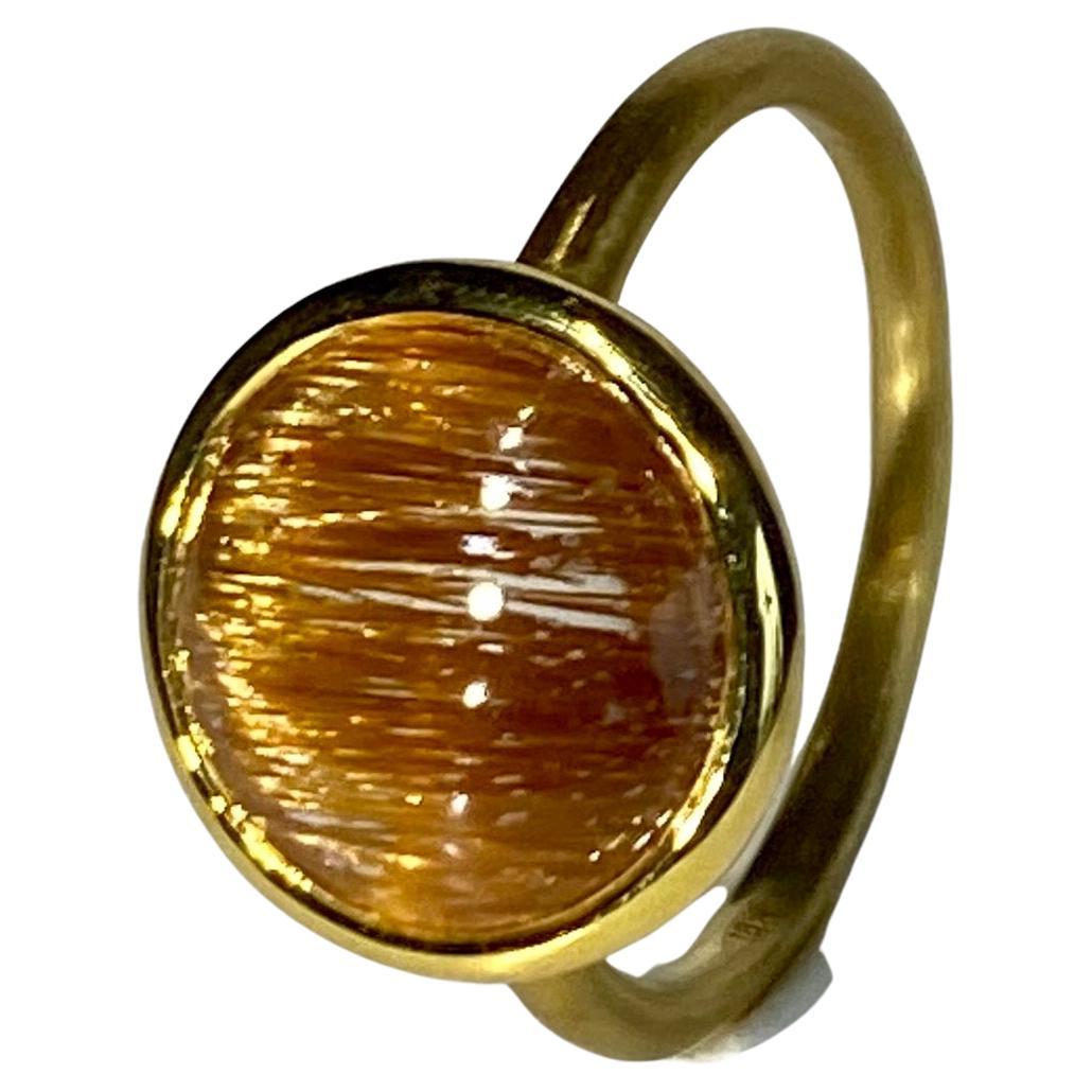 18kt Brushed Yellow Gold Ring set with a Rutile Quartz Cabochon For Sale