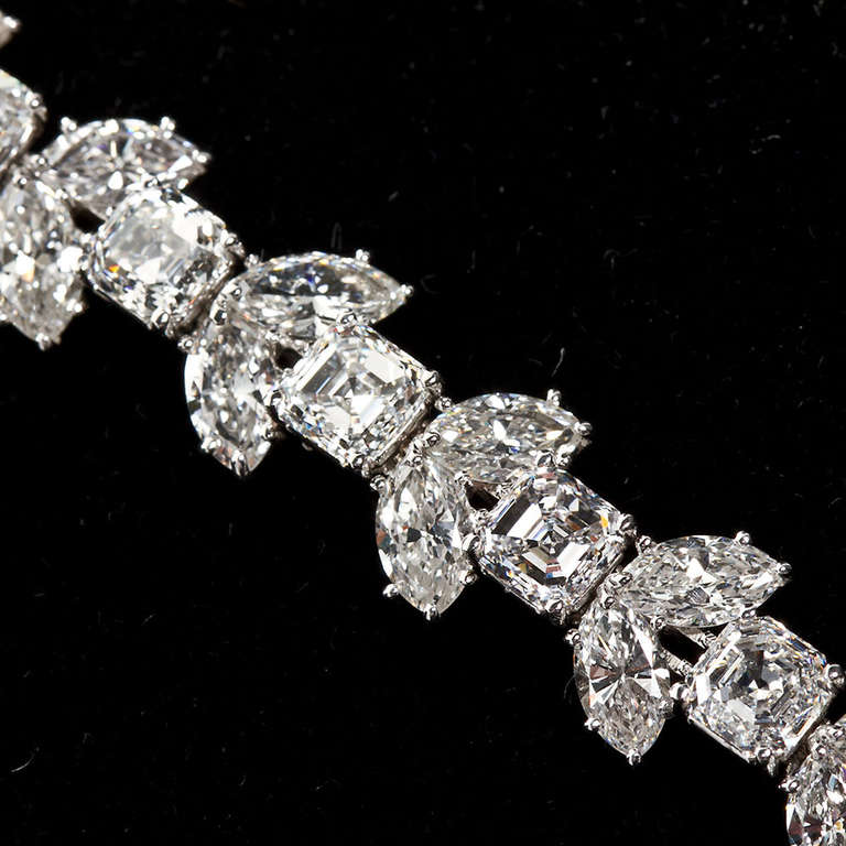 An exceptional diamond in platinum diamond bracelet contains 16 asscher cut diamonds 16.35ctw and and 32 marquise 12.80ctw.  All diamonds are D-G VVS-VS.  Measures 71/4 long by 1/2