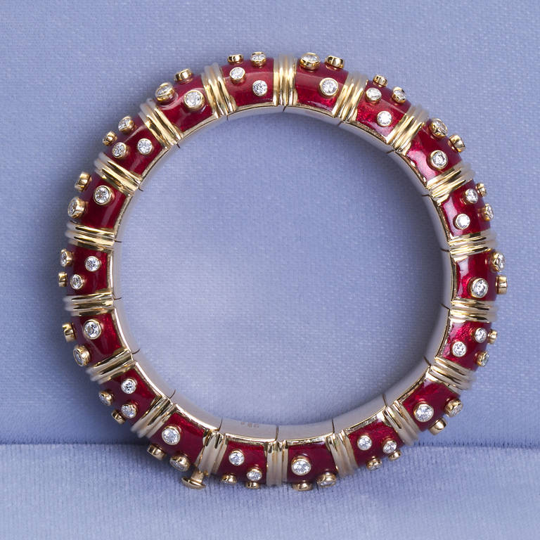 A classic ruby red enamel on 18k yellow gold in the 