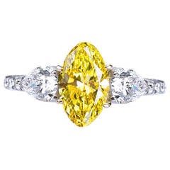 Fancy Vivid Yellow 1.80 carat Oval Diamond Engagement Ring