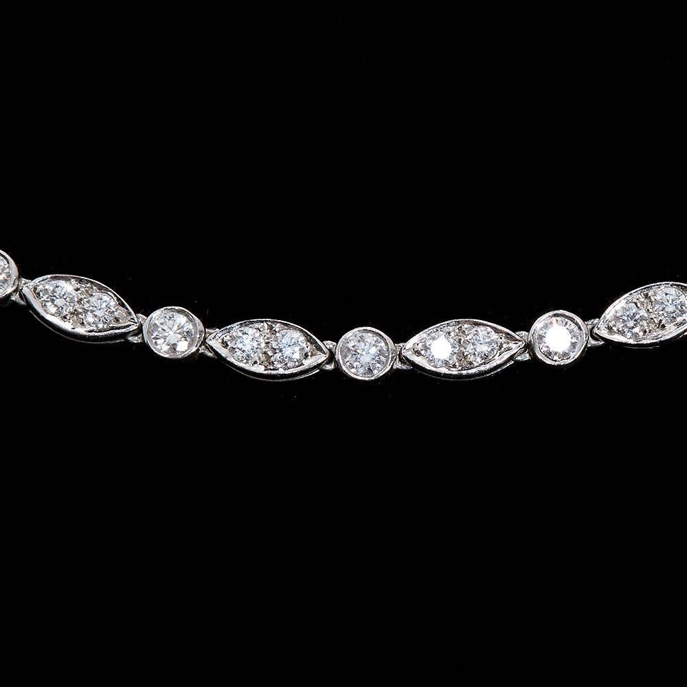 A very fine diamond in platinum necklace contains approx. 3.50 carats of round brilliant diamonds of G color VS clarity. Necklace length 16 inches. Signed T & Co. for Tiffany & co..

Dealer ref No. 7167