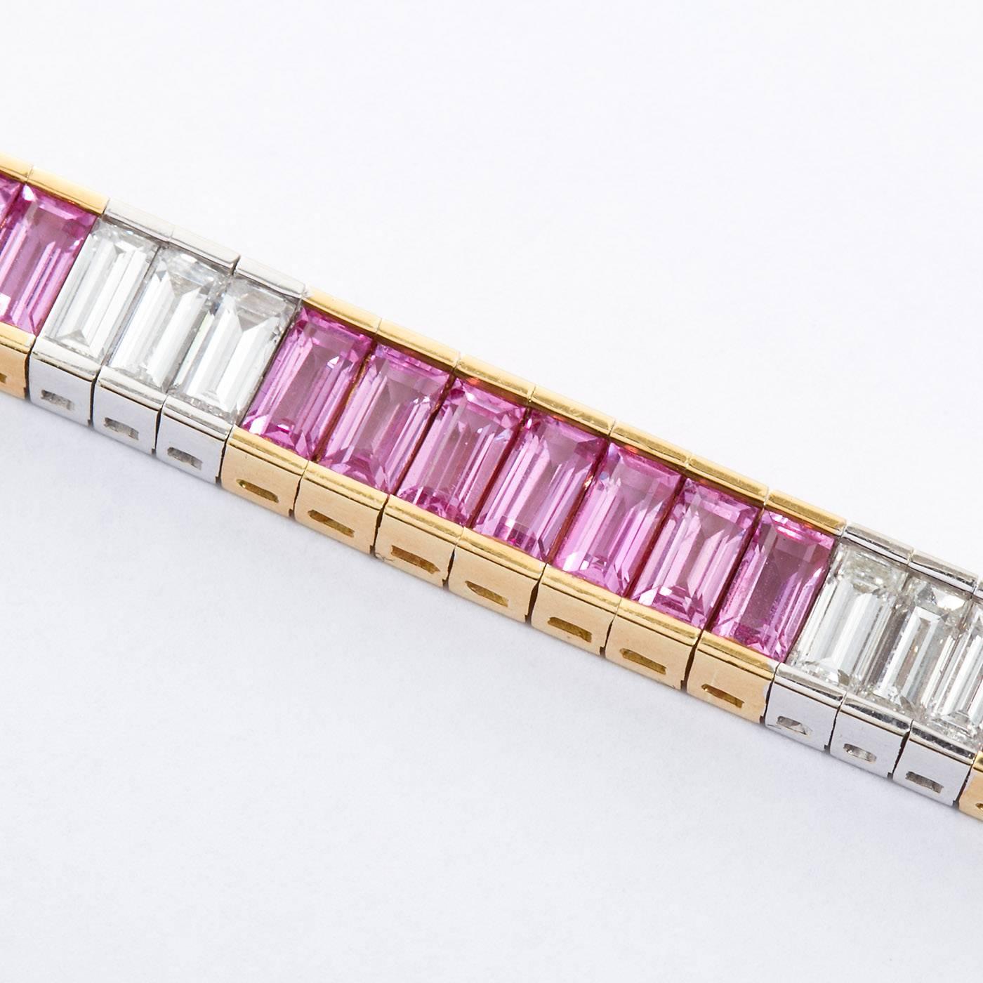 A simply fabulous baguette shaped pink sapphire and white diamond line tennis bracelet. Contains 49 pink sapphire baguettes weighing approx. 13.00 ctw and 21 white diamond baguettes weighing approx. 4.75 ctw set in 18k yellow and white