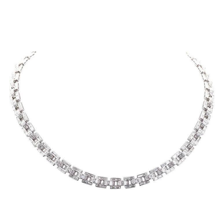 Diamonds a girls best friend? Perhaps.  But you definitely will make that grade if you present this unique necklace to your significant other.  This very fine Italian made diamond in 18 karat white gold necklace made of rectangular baguette shaped