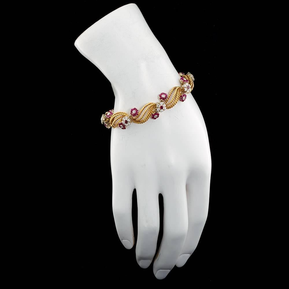 Spiraled Gold Diamond Ruby Florets Bracelet In Excellent Condition In Lakewood, NJ