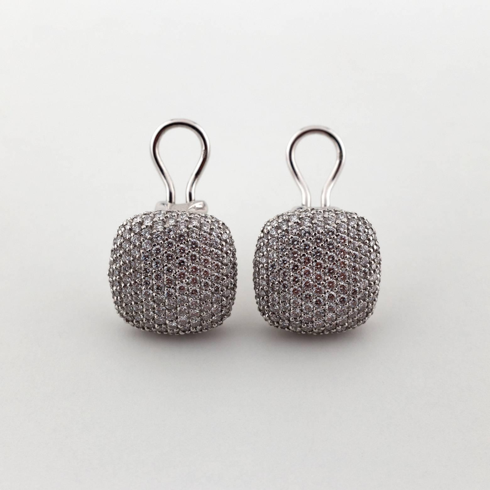 These stud earrings shine from across the room dazzling with 3.58 tw diamonds! They are stunning and elegant and absolutely amazing!!! A must have!!! You'll want to create events just so you can wear these on a regular basis!
