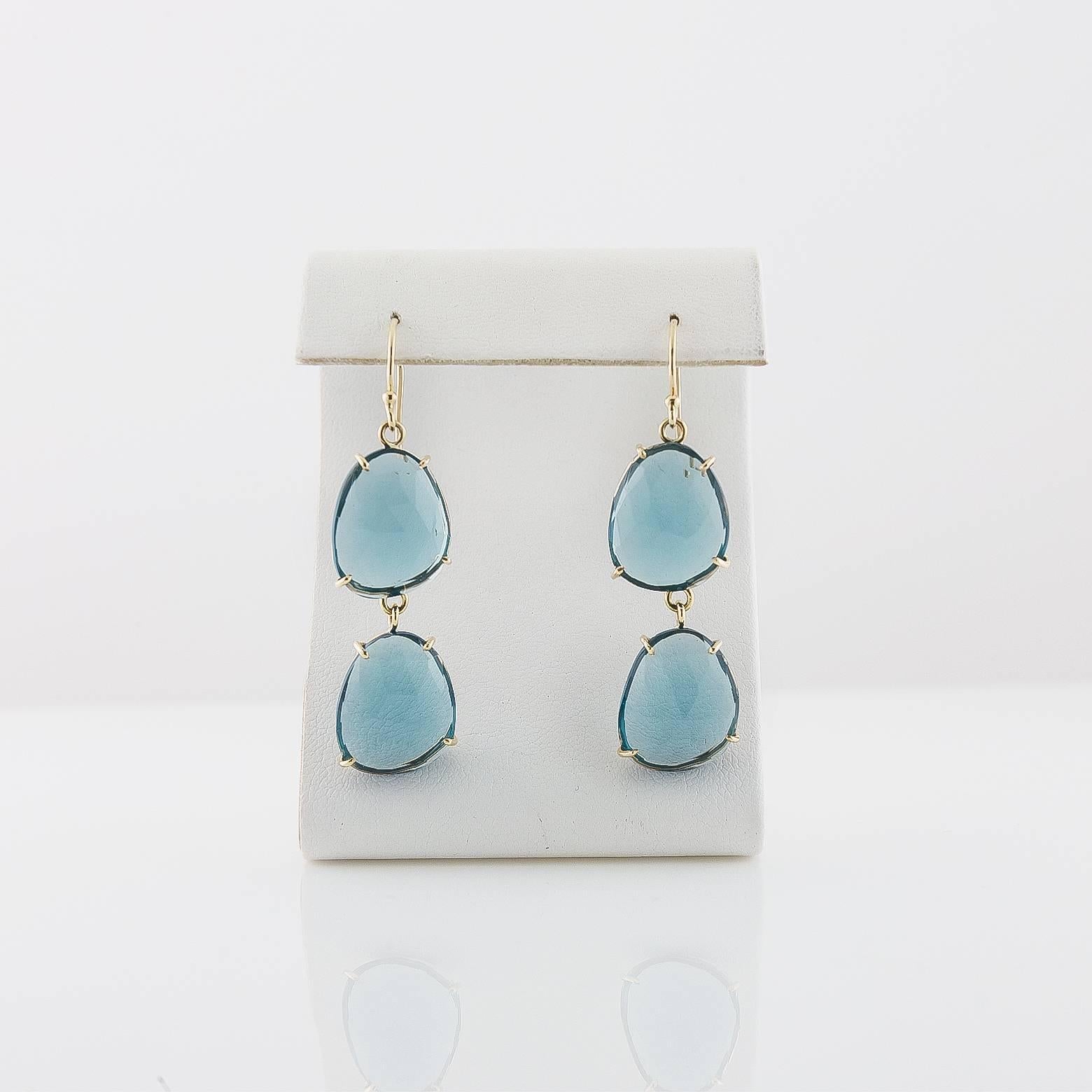 These stunning ocean and sky blue topaz earrings are dazzling. Delicately set in 14k and elegant. They can easily be dressed up or down to create any look that you like. 