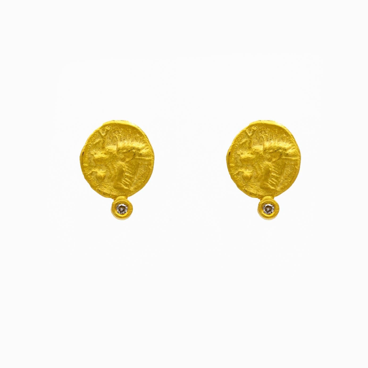 The stamp on these coin and diamond earrings resemble some sort of mythical feline creature- almost like a lion or a leopard. Exquisitely detailed the texture is divine- like a rich creamy satin matte. The total weight on the diamonds in both