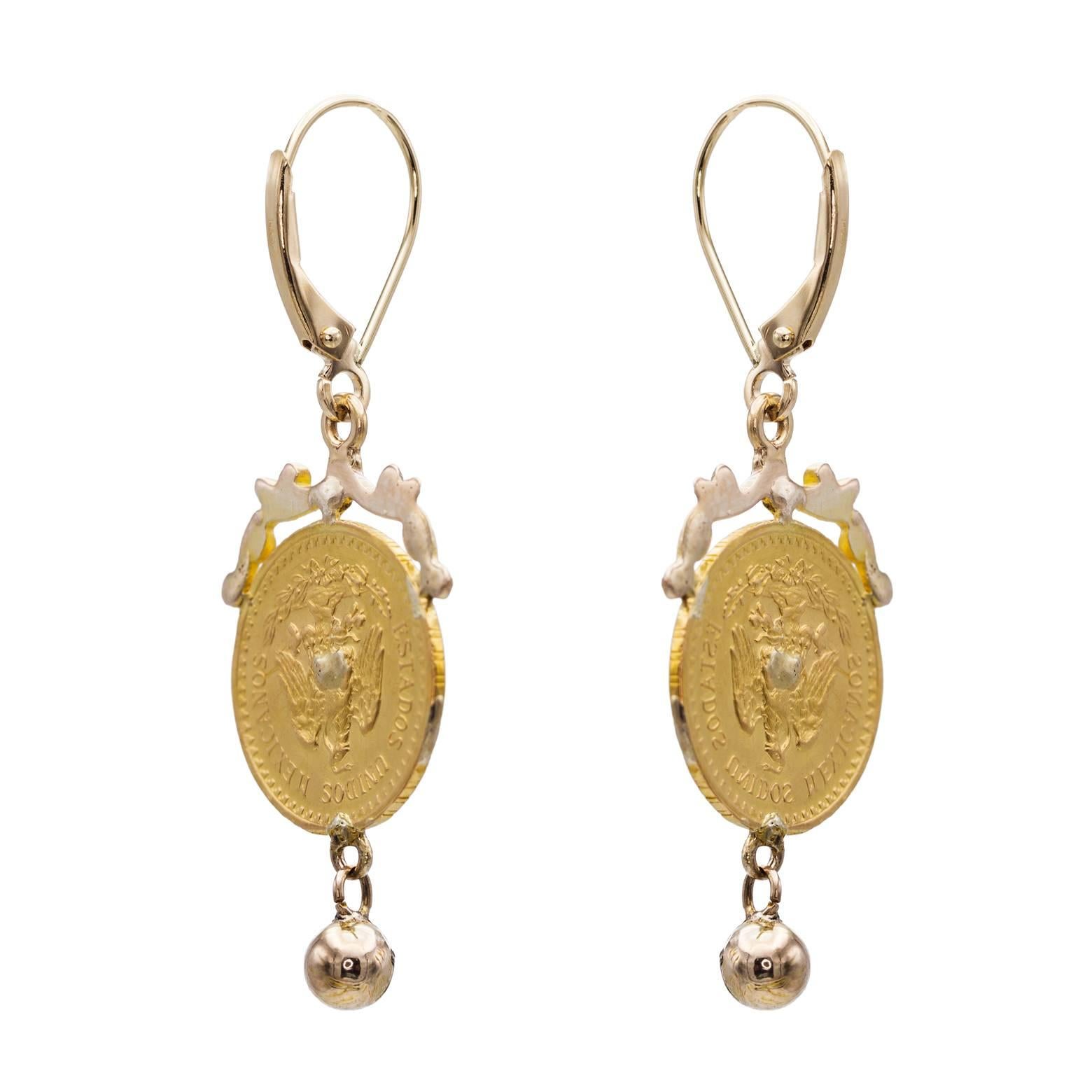 These golden pesos are made of 22K yellow gold and adorned with intricate 14K yellow gold embellishment- a gorgeous design! These coins are circa 1945 and the overall grandeur of these earrings is exquisite. Fun, elegant and remarkable! 
