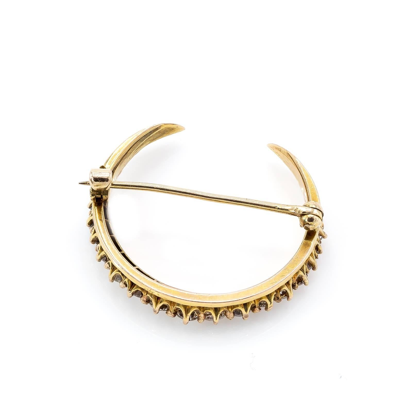 25 stunning brilliant diamonds dress up this 14K yellow gold crescent moon pin/brooch. Antique and Art Deco and absolutely gorgeous. 