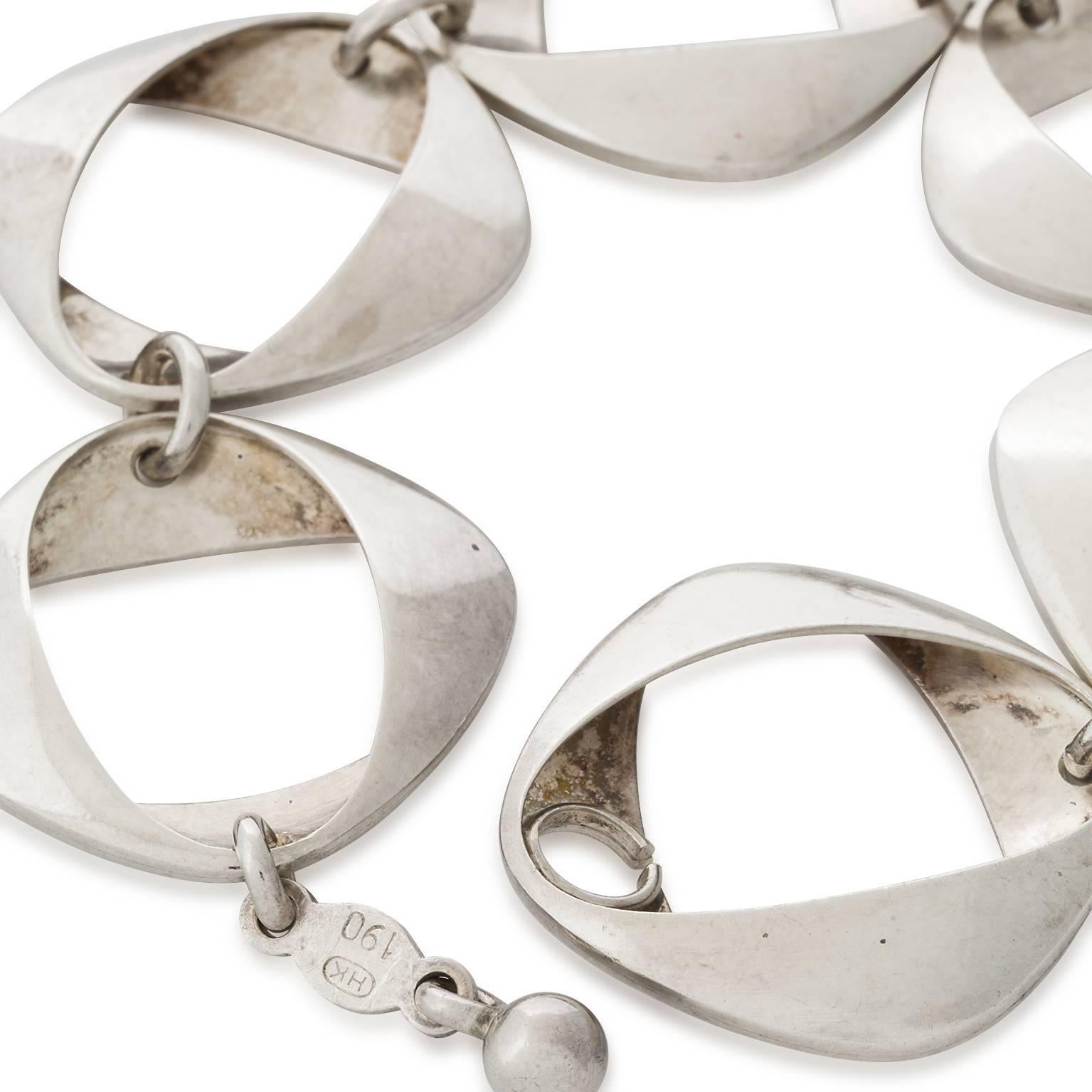 Henning Koppel designed Sterling silver link bracelet made in his signature oval ribbon  design for the Georg Jensen Design Studio.