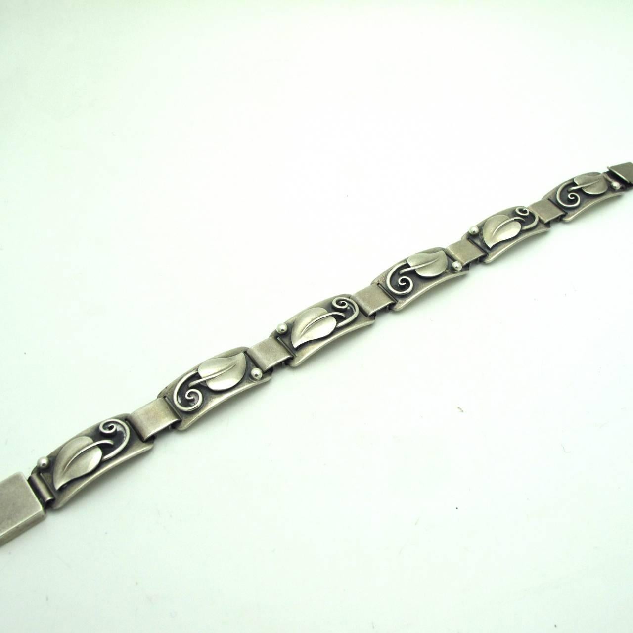Elegant and botanical this bracelet is a perfect companion to your other vintage bracelets. Stunning worn alone with carved leaves and oxidized accents.