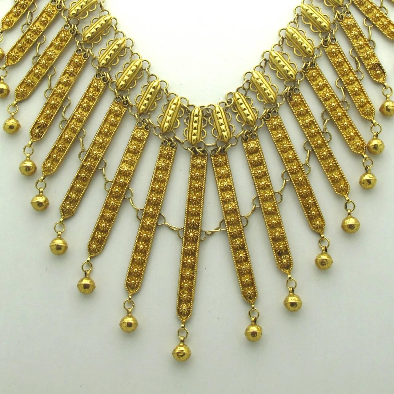 Amazingly beautiful in design and intricate detail this 18kt gold  necklace is a wonderful statement.
