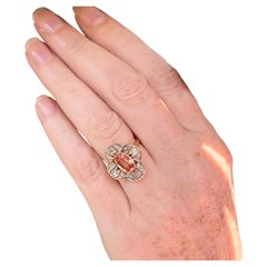 Padparadschah Oval Sapphire Approximately 1.10 Carat, Diamond & 14 Karat Ring
